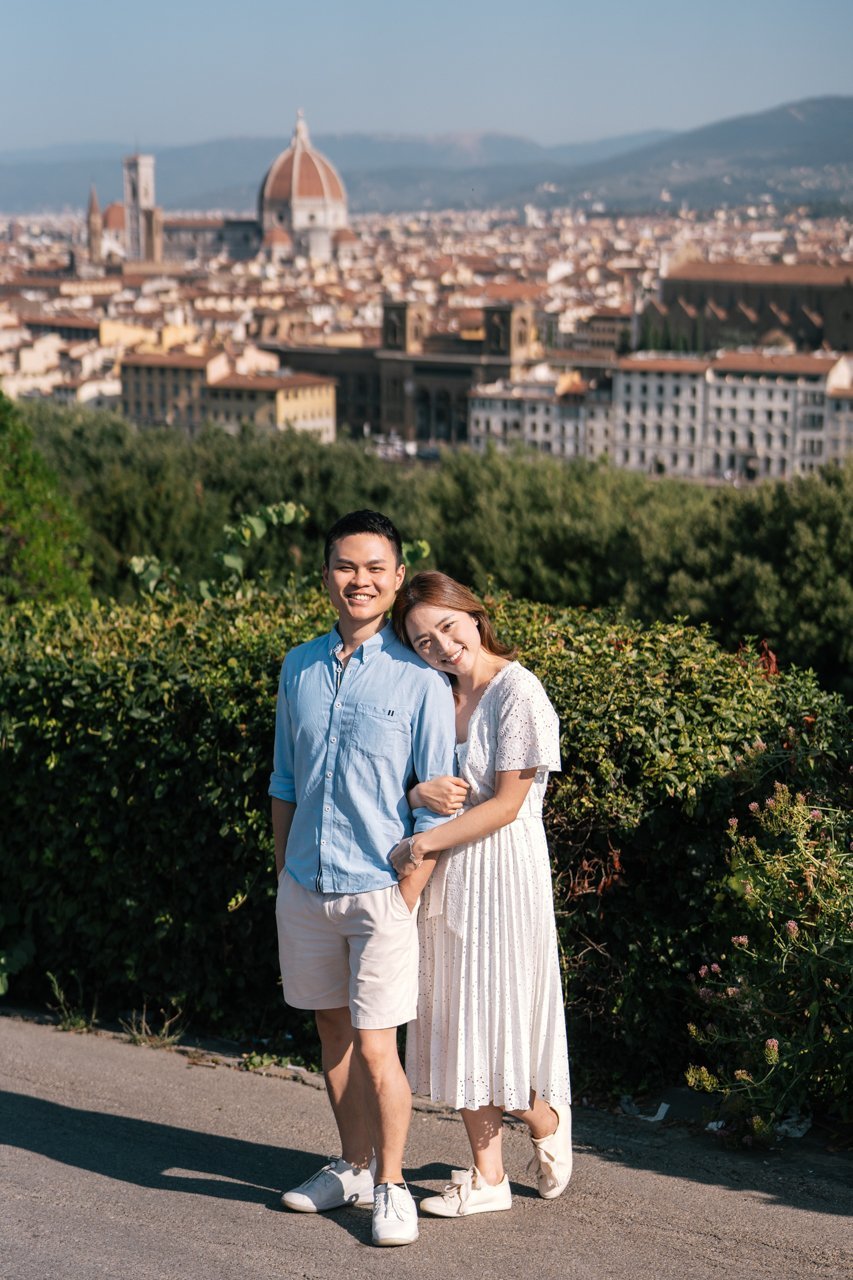 Couple during a vacation photoshoot in a scenic destination